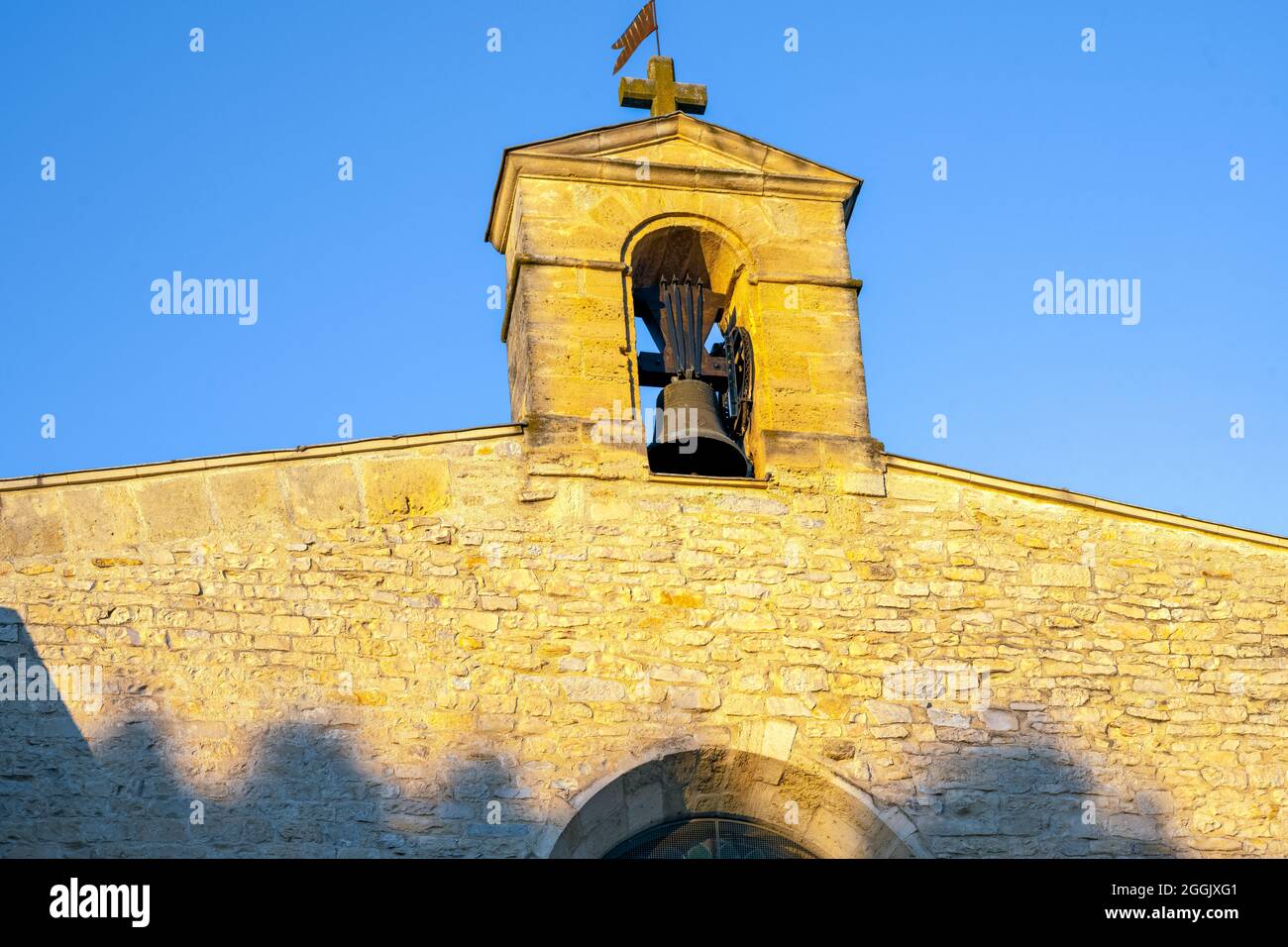 Triangular pediment of Saint Saturnin church in Calvisson, Gard, France Stock Photo