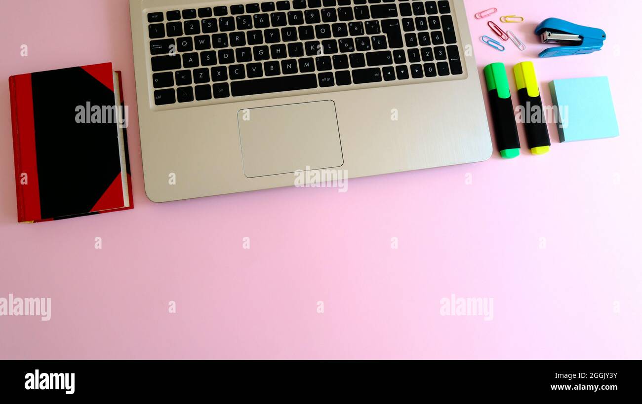 Stylish workspace with laptop computer, smartphone and modern office ...