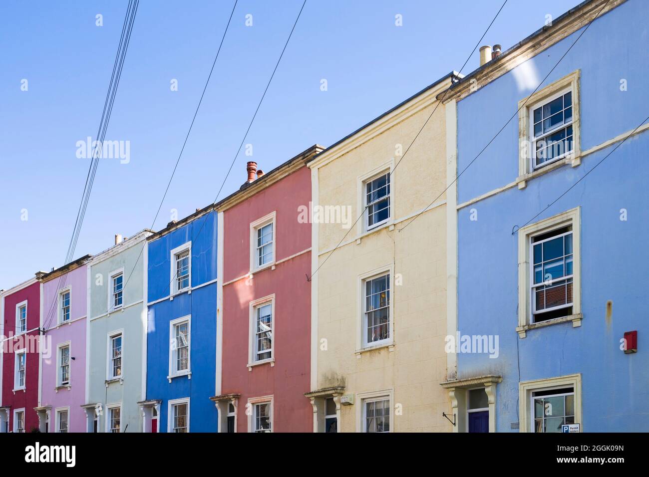Colourful painted Georgian terraced houses in Ambrose Road, Cliftonwood, Bristol. Stock Photo