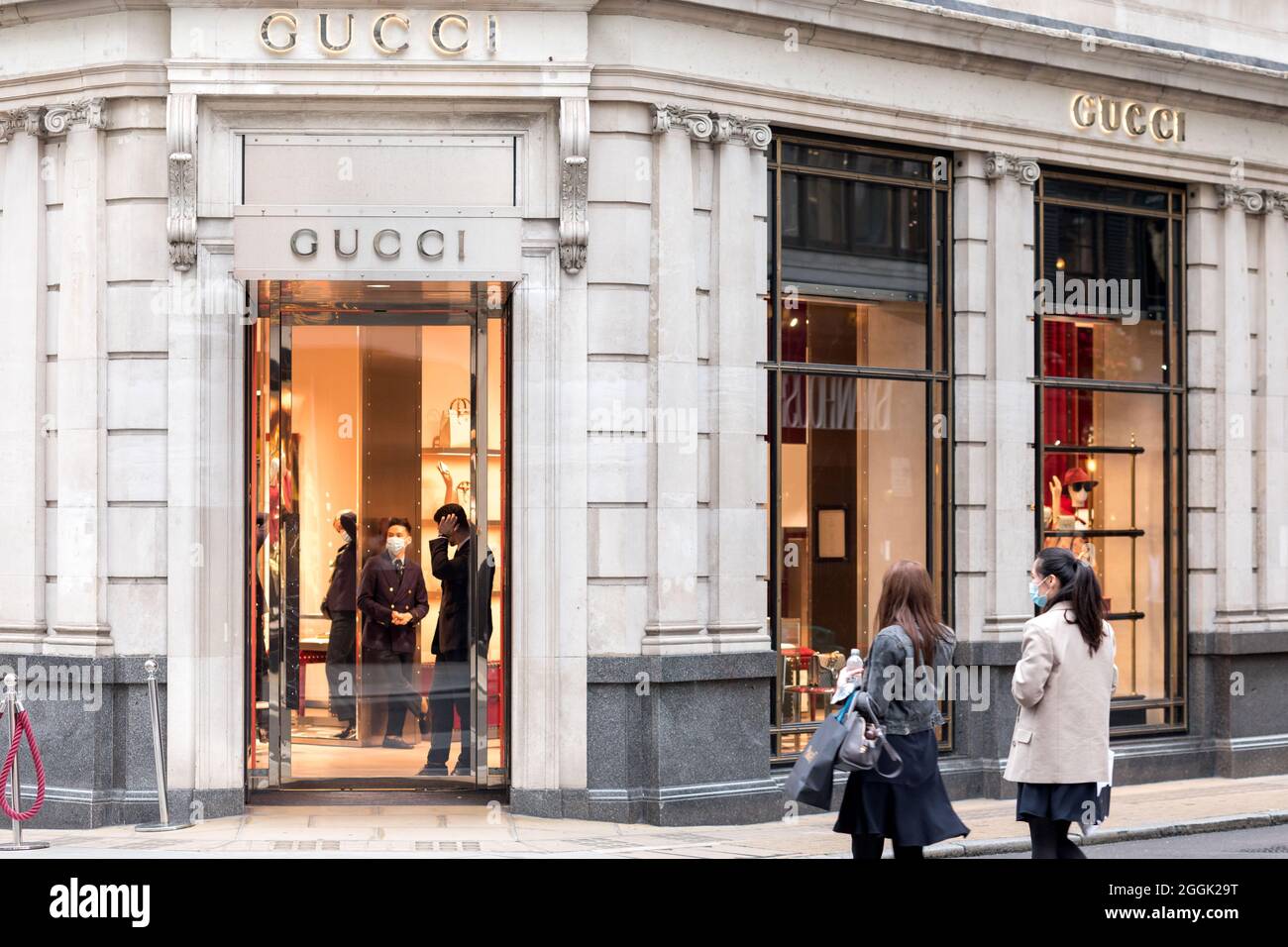 London, UK. 31st Aug, 2021. Two girls walk across Gucci store on New Bond  street. Credit: SOPA Images Limited/Alamy Live News Stock Photo - Alamy