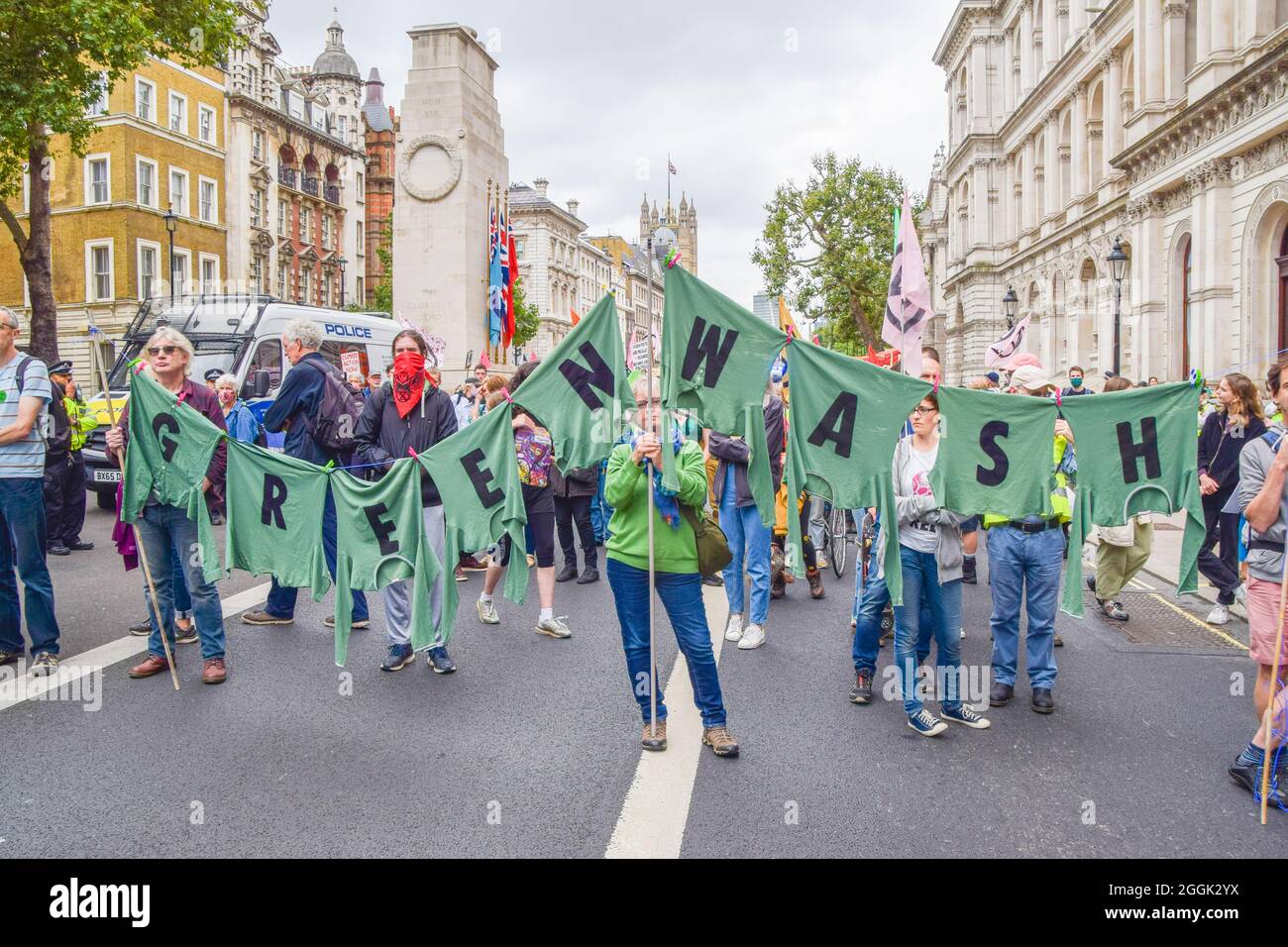 London, UK. 01st Sep, 2021. Protesters hold a clothes line with letters on the attached shirts spelling out 'Greenwash' during the demonstration outside Downing Street. Extinction Rebellion protesters staged a 'greenwash' protest in Westminster, part of their two-week Impossible Rebellion campaign calling on the UK Government to act meaningfully on the climate and ecological crisis. (Photo by Vuk Valcic/SOPA Images/Sipa USA) Credit: Sipa USA/Alamy Live News Stock Photo