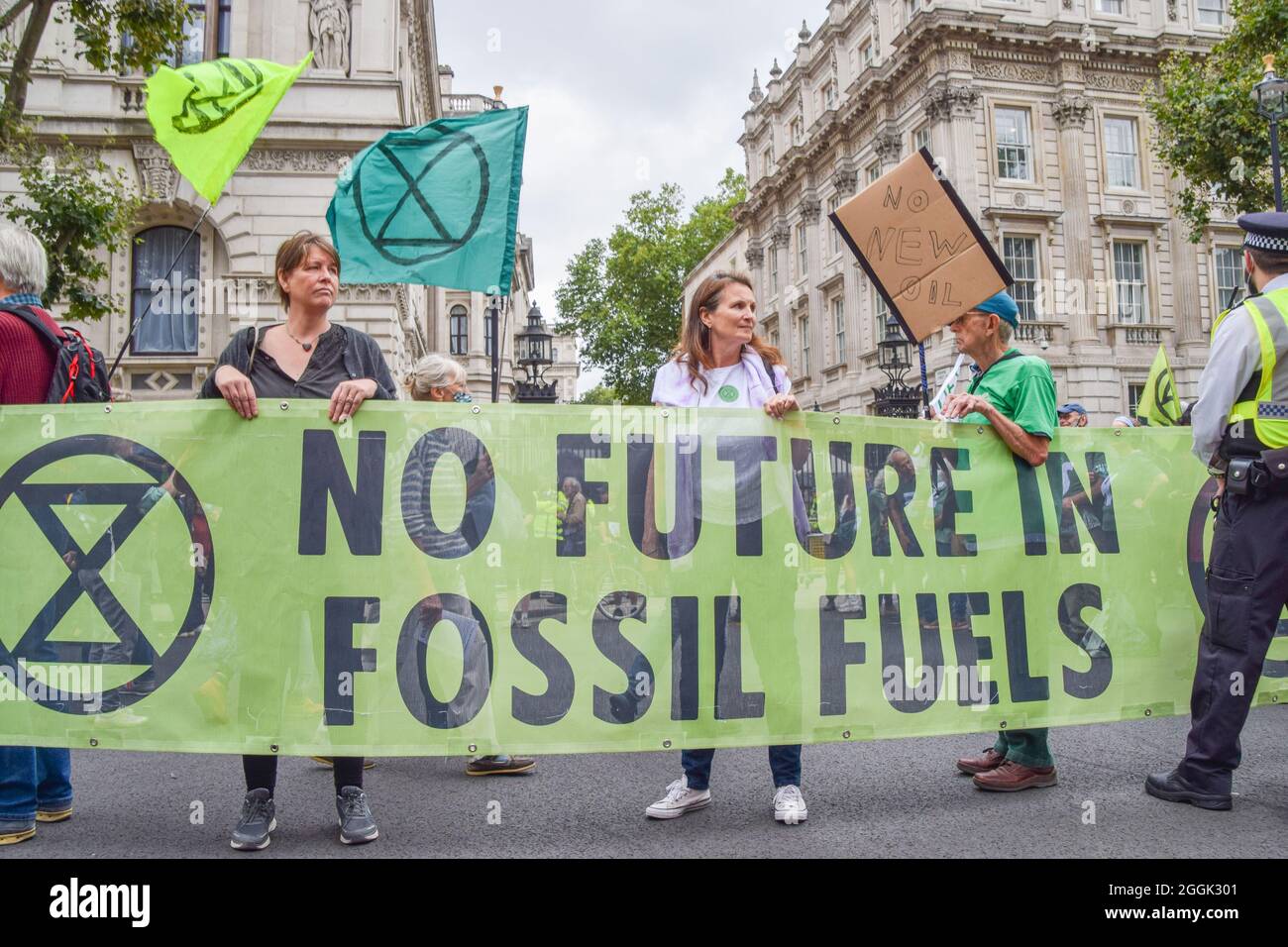 London, UK. 01st Sep, 2021. Protesters hold a 'No Future In Fossil Fuels' banner during the demonstration outside Downing Street. Extinction Rebellion protesters staged a 'greenwash' protest in Westminster, part of their two-week Impossible Rebellion campaign calling on the UK Government to act meaningfully on the climate and ecological crisis. (Photo by Vuk Valcic/SOPA Images/Sipa USA) Credit: Sipa USA/Alamy Live News Stock Photo