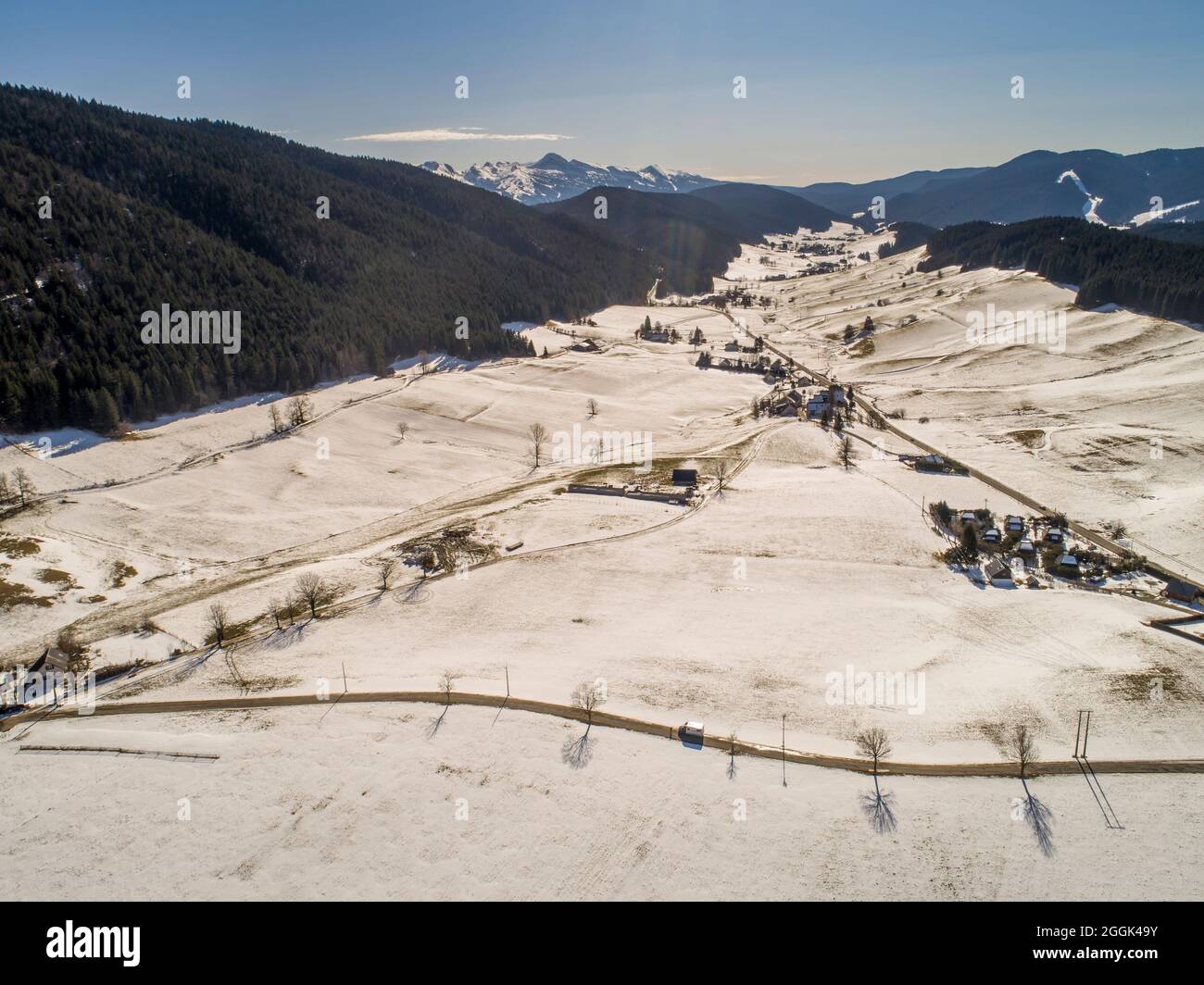 Winter camping with the motorhome. Drone shot of the snow-covered plateau of Autrans Méaudre, Vercors, Auvergne-Rhone-Alpes. . Stock Photo