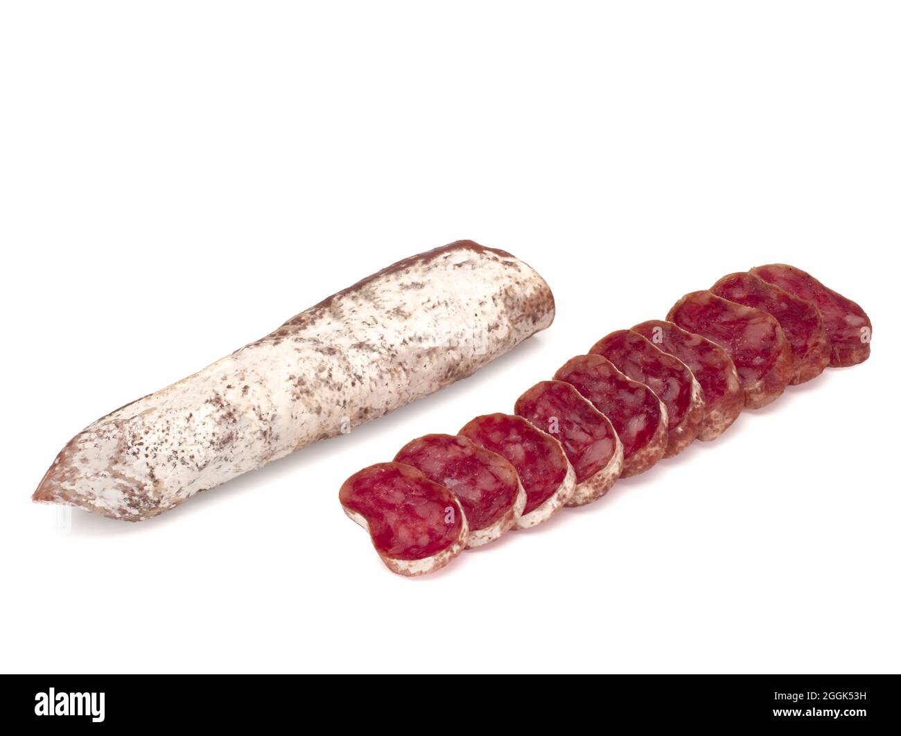 Traditional Spanish Fuet thin dried sausage with slices, Closeup