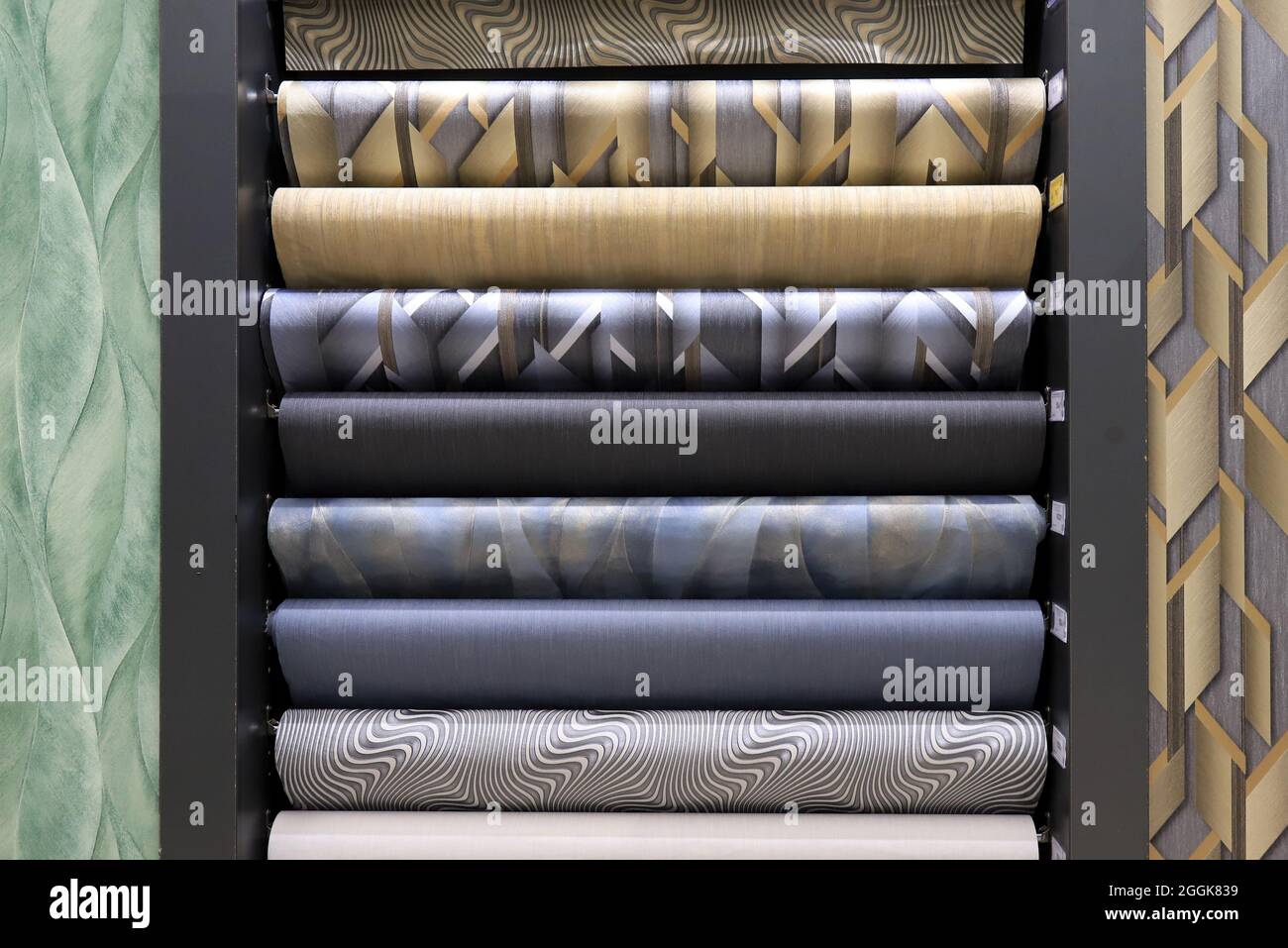 Rolls of vinyl wallpaper for finishing walls. Decorative materials for