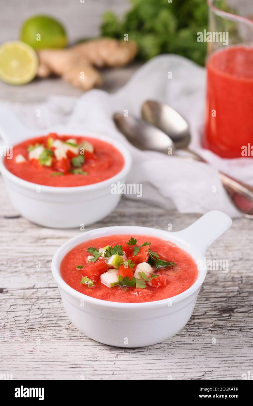 Watermelon tomato gazpacho in bowls. Traditional Spanish cold soup. Stock Photo