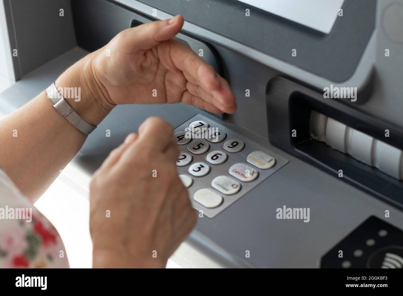 an ATM, at the customer's service to withdraw money. Finance concept ...
