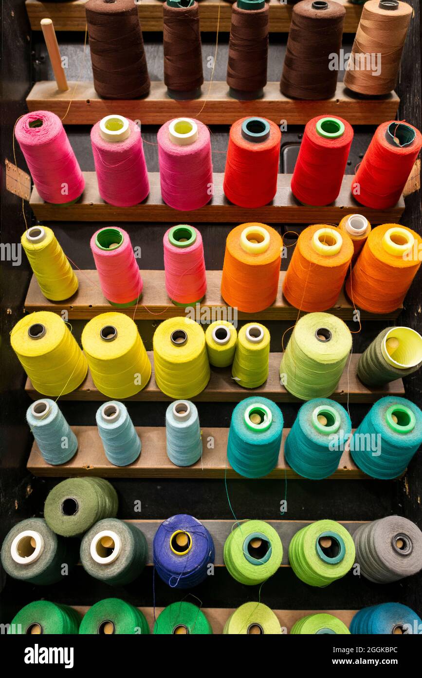 Different colored sewing thread in the cloakroom of the Totem tent show, Cirque du Soleil 2020, Theresienwiese, Munich, Bavaria, Germany Stock Photo