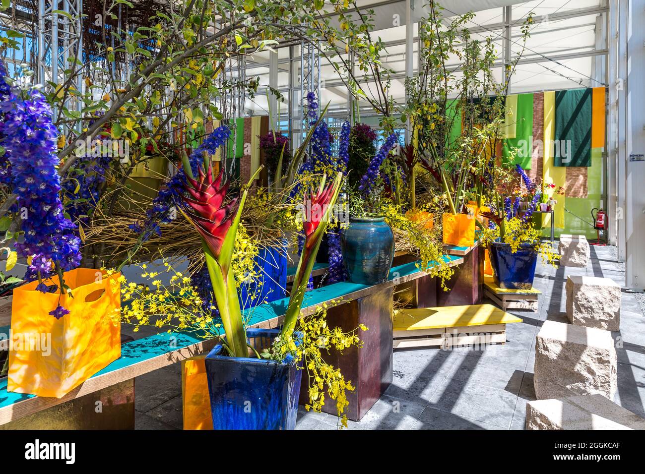 Flower arrangement with heliconia, orchids and delphiniums, flower hall, inspiration nature, state horticultural show, Ingolstadt 2020, new term 2021, Ingolstadt, Bavaria, Germany, Europe Stock Photo