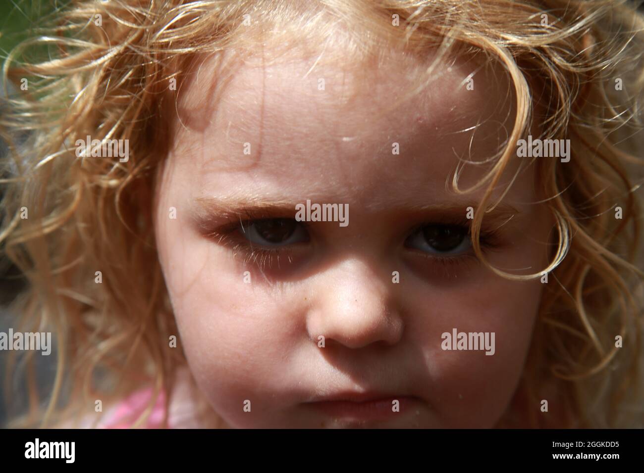 3 year old girl being told off. Stock Photo