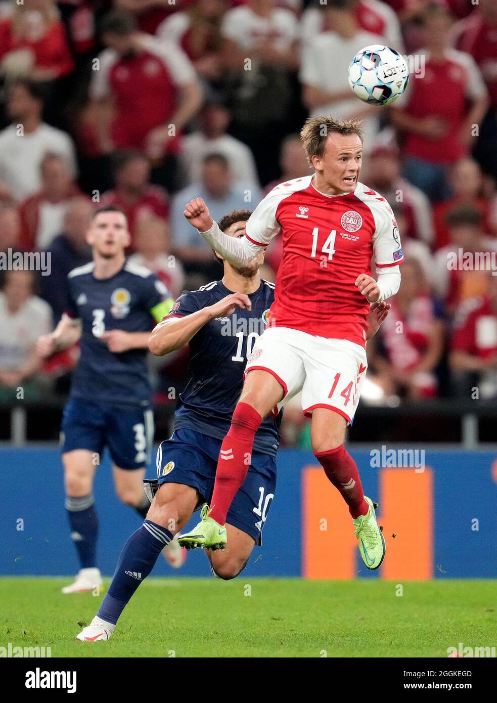 Scotland's Che Adams and Denmark's Mikkel Damsgaard (right) battle for