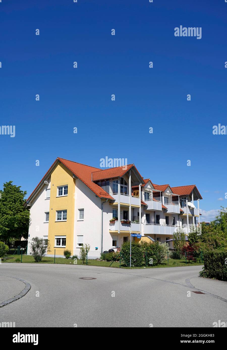 Germany, Bavaria, Upper Bavaria, Altötting district, residential complex, apartment building, dormer windows, tiled roof, balconies, garden Stock Photo