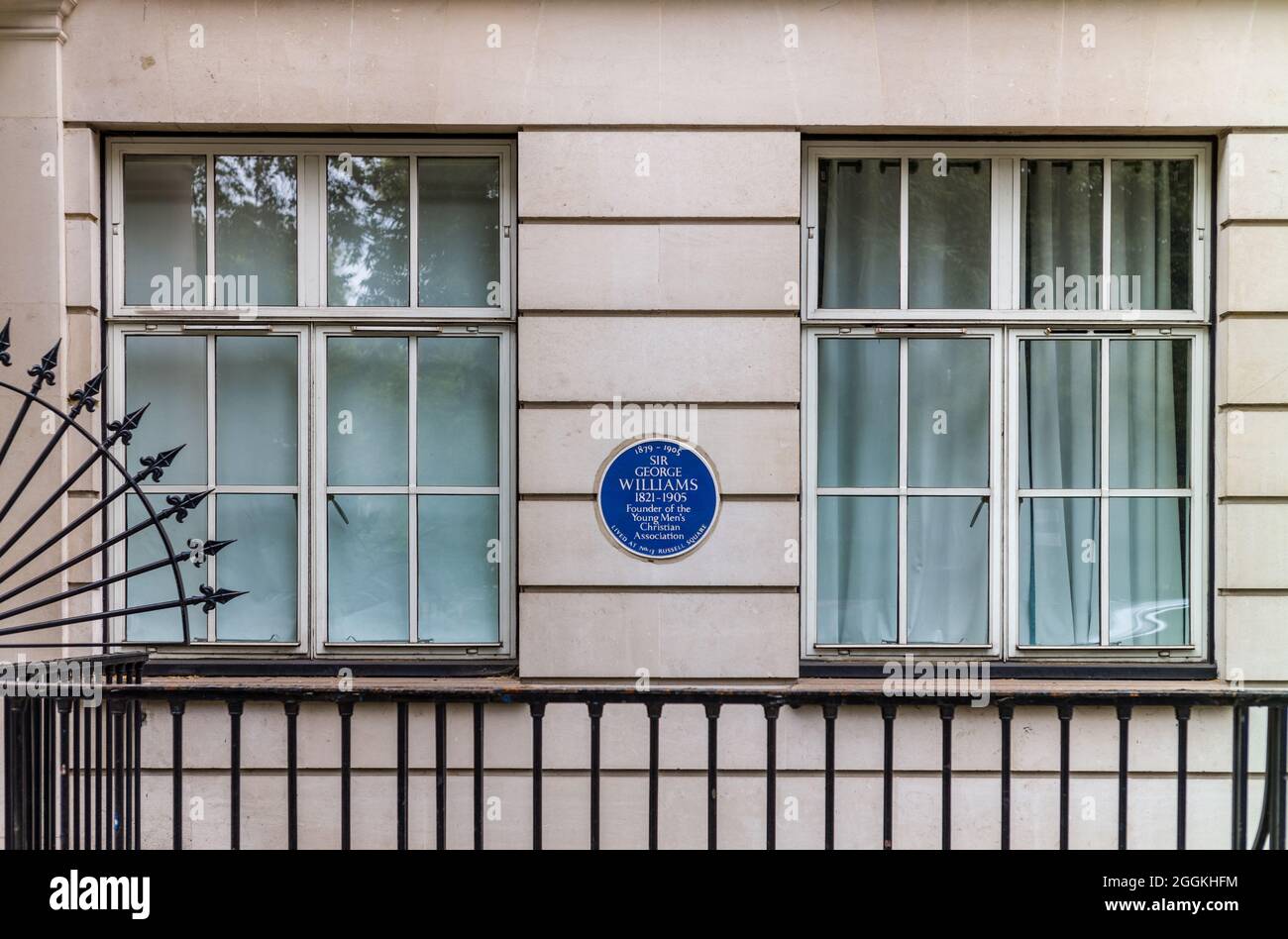 Sir George Williams Blue Plaque Sir George Williams 1821-1905 founder of Young Men's Christian Association lived at No.13 Russell Square 1879-1905. Stock Photo