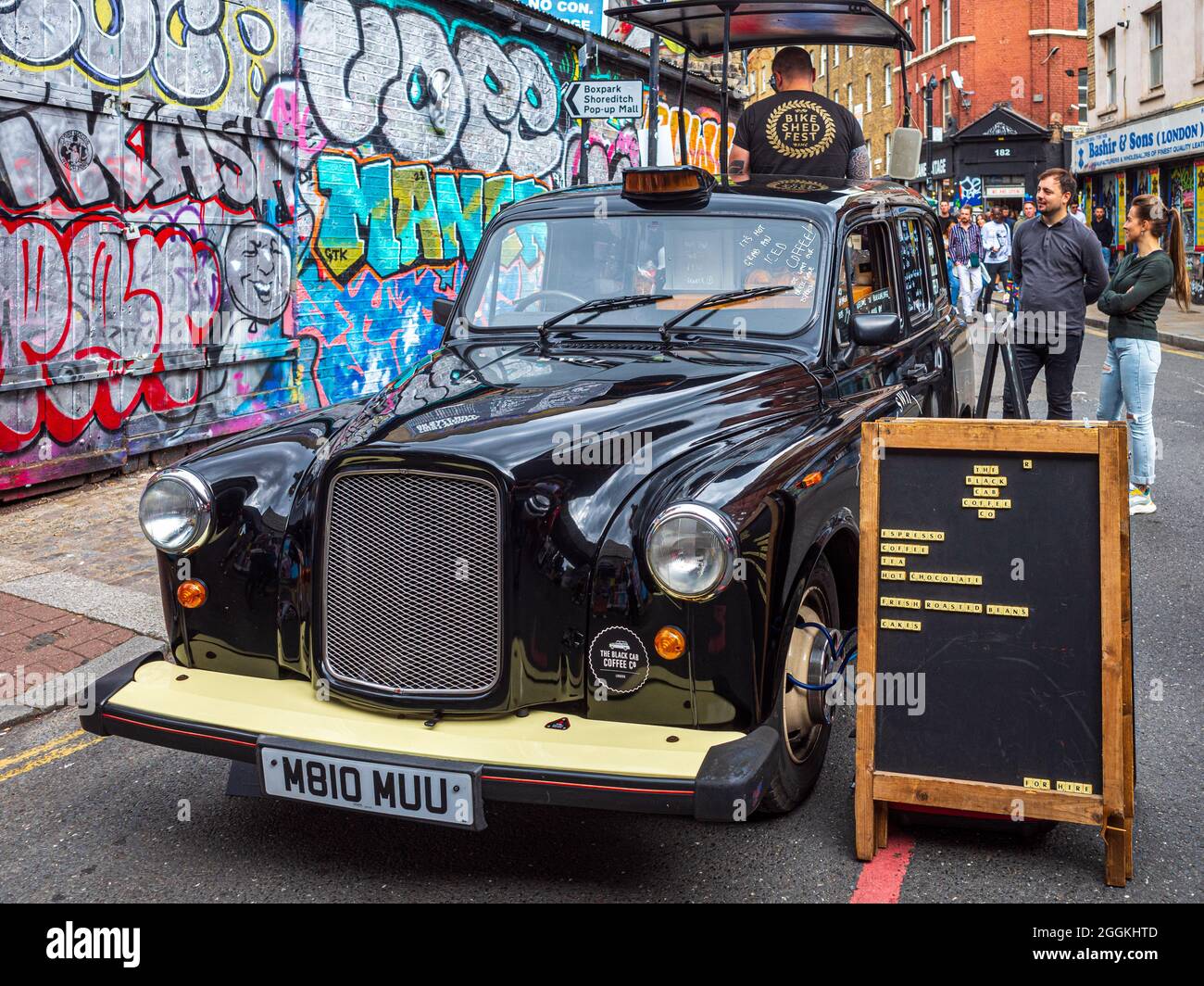 London Taxi Coffee - Black Cab Coffee Company uses a converted London Taxi to serve coffee in Brick Lane Shoreditch East London. Stock Photo