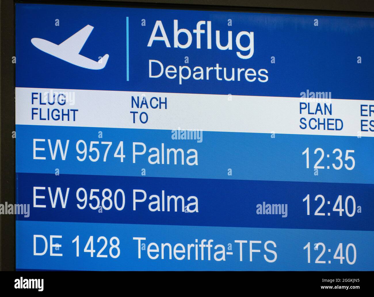 Duesseldorf, North Rhine-Westphalia, Germany - Duesseldorf Airport, holiday start in NRW, departure to Mallorca, display board shows departures to Palma and Tenerife, summer vacation in times of the corona pandemic. Stock Photo