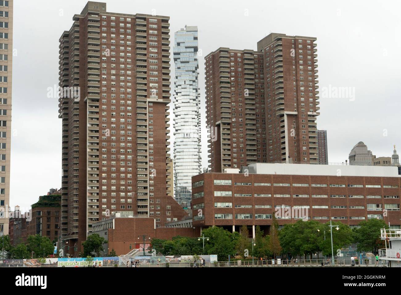 Apartment buildings tower over the Borough of Manhattan Community College and Hudson River Park in the Tribeca neighborhood of Lower Manhattan. Stock Photo