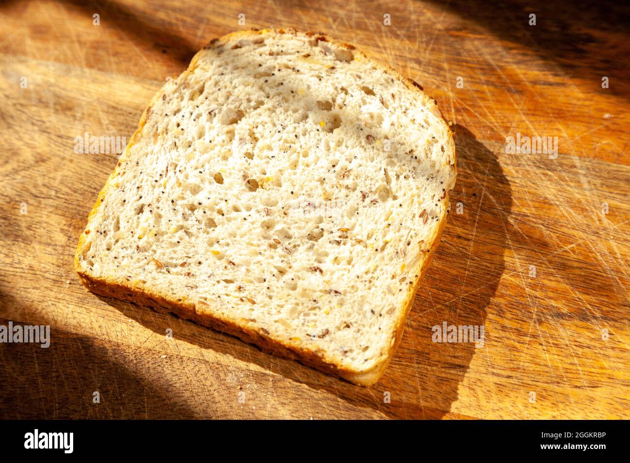 One slice of multigrain bread Stock Photo