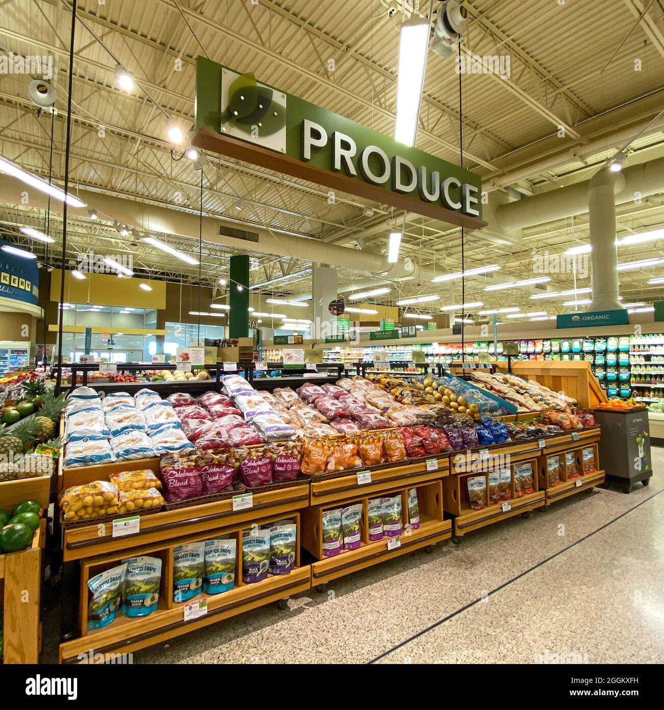 Grocery Store Produce Aisle Stock Photo by Mint_Images