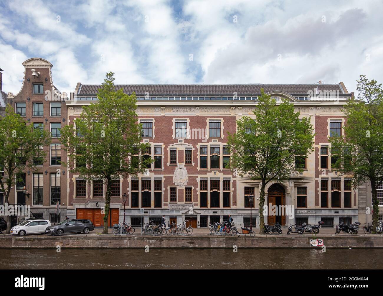 Amsterdam, Netherlands - August 13, 2021: Historic palace turned into multiple dwellings with Roman-Greek sculptures and frescos on Herengracht 531-53 Stock Photo