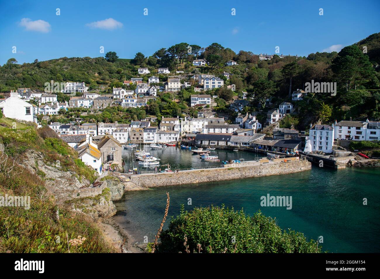 Polperro is a large village, civil parish, and fishing harbour within the Polperro Heritage Coastline in south Cornwall, England. Its population is ar Stock Photo