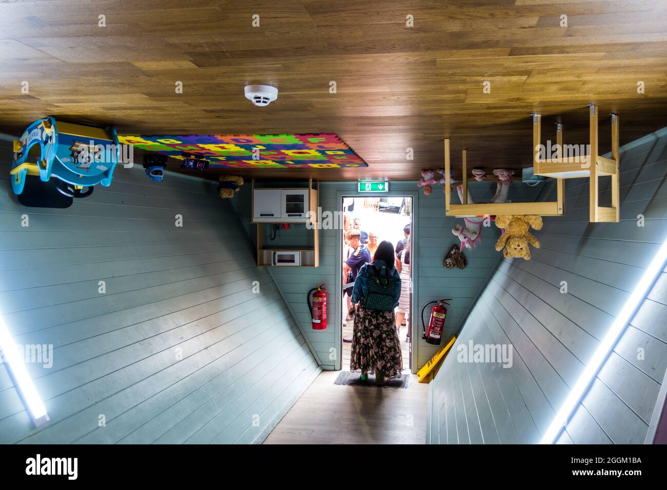 Upside down house interior setup to provide optical illusion for