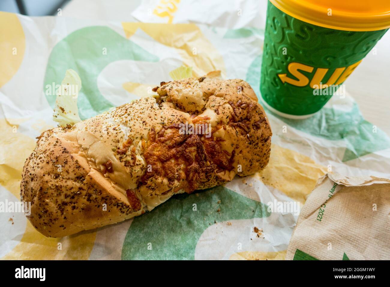 Close up of a 6 inch Subway bread and a drink cup Stock Photo Alamy