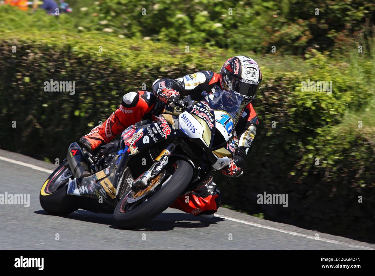 Peter Hickman approaching the Gooseneck corner during the 2019 Isle of Man Supersport TT race in the Isle of Man on the 675cc Triumph Stock Photo