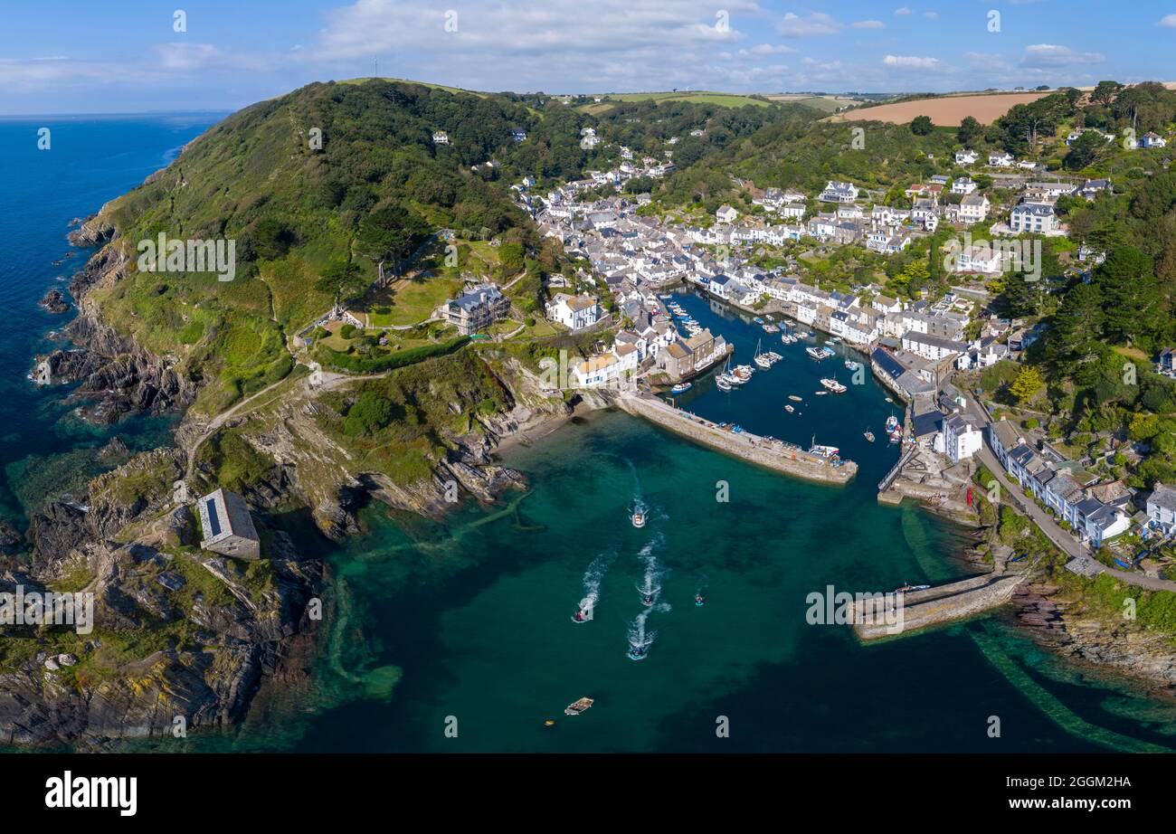 Polperro is a large village, civil parish, and fishing harbour within the Polperro Heritage Coastline in south Cornwall, England. Its population is ar Stock Photo