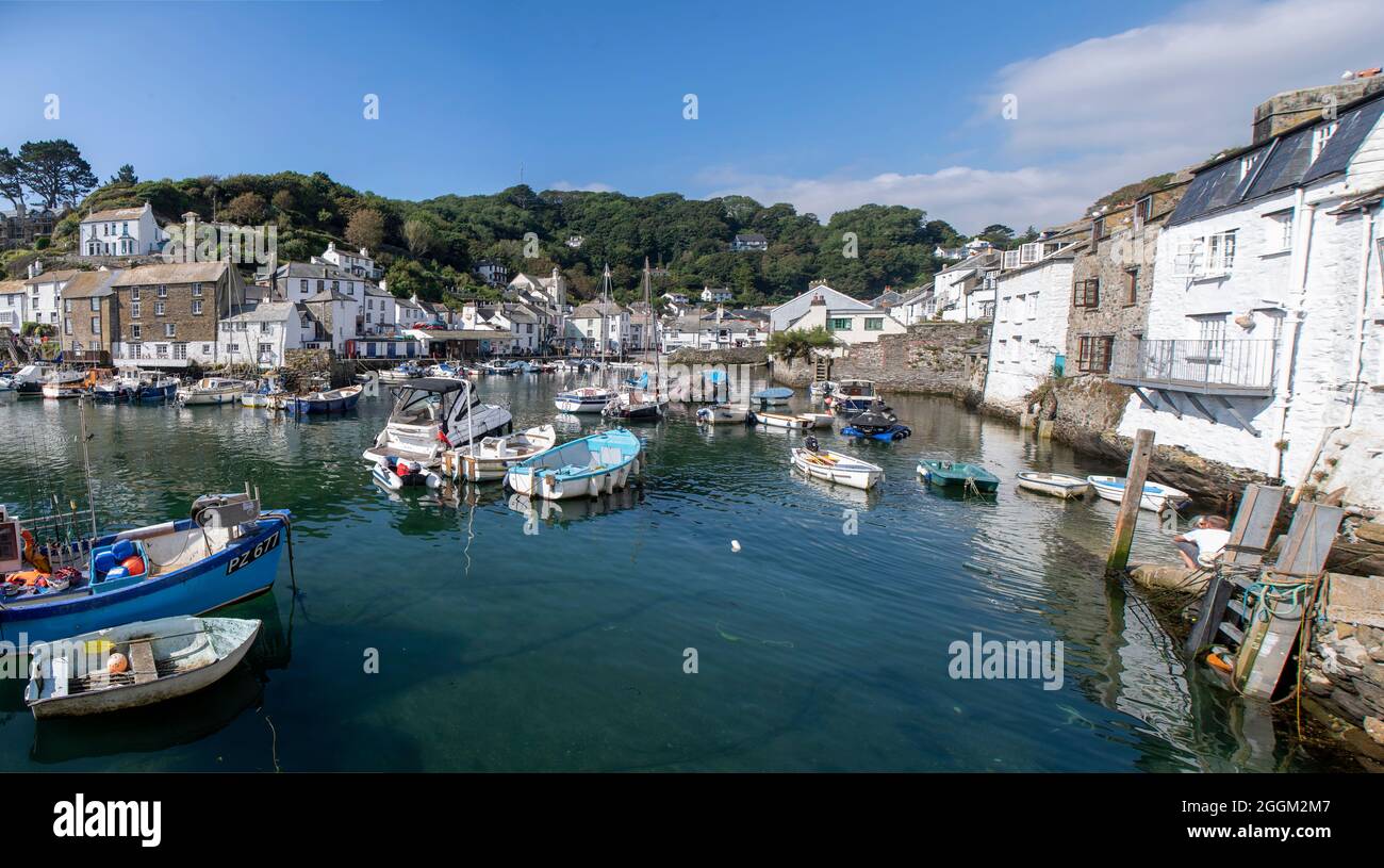 Polperro is a large village, civil parish, and fishing harbour within the Polperro Heritage Coastline in south Cornwall, England. Its population is ar Stock Photo