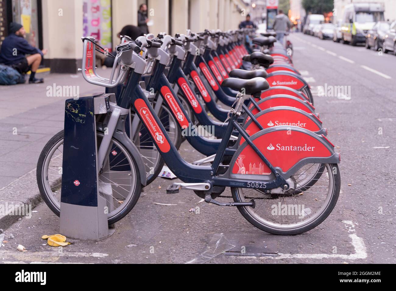 Santander bikes line up in docking station near Covent Garden London