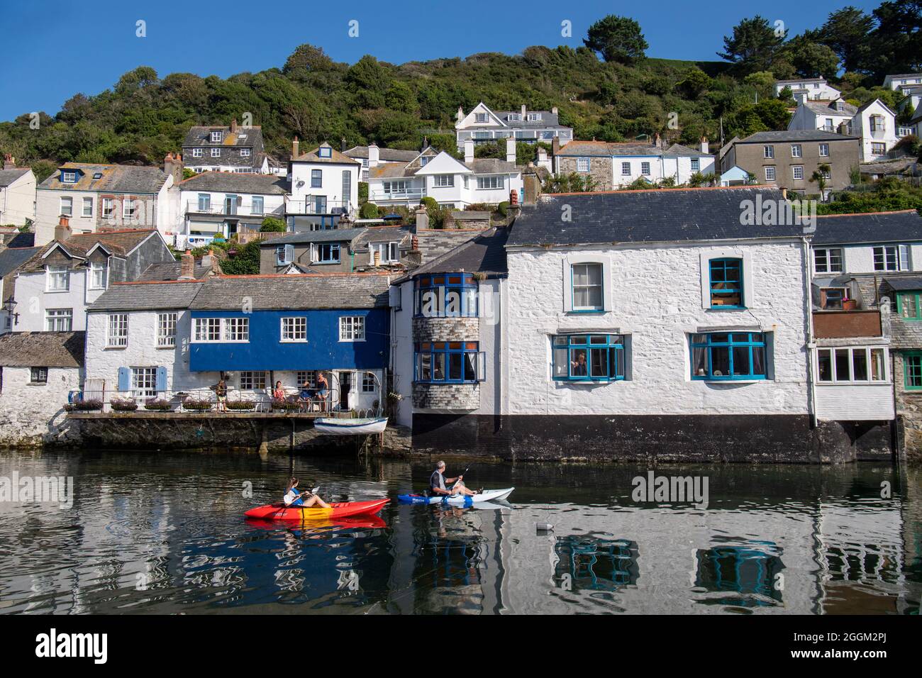 Polperro is a large village, civil parish, and fishing harbour within the Polperro Heritage Coastline in south Cornwall, England. Its population is ar Stock Photo