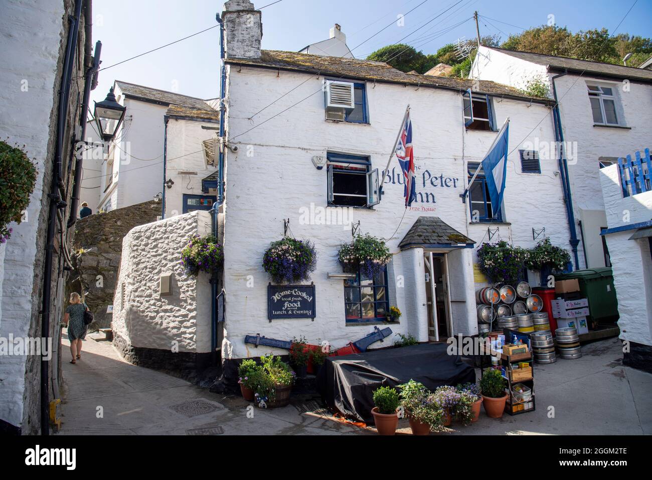 Polperro is a large village, civil parish, and fishing harbour within the Polperro Heritage Coastline in south Cornwall, England. Its population is ar Stock Photo