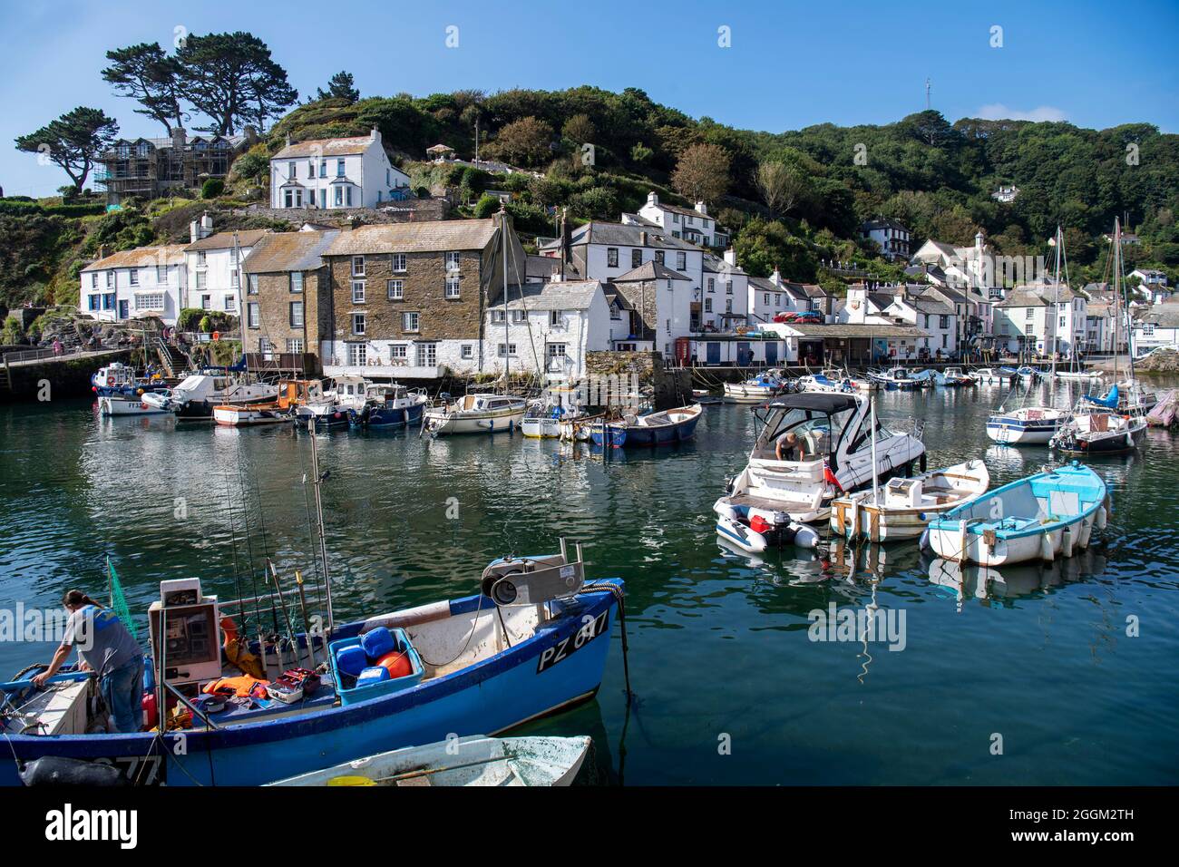 Polperro is a large village, civil parish, and fishing harbour within the Polperro Heritage Coastline in south Cornwall, England. Its population is ar Stock Photo