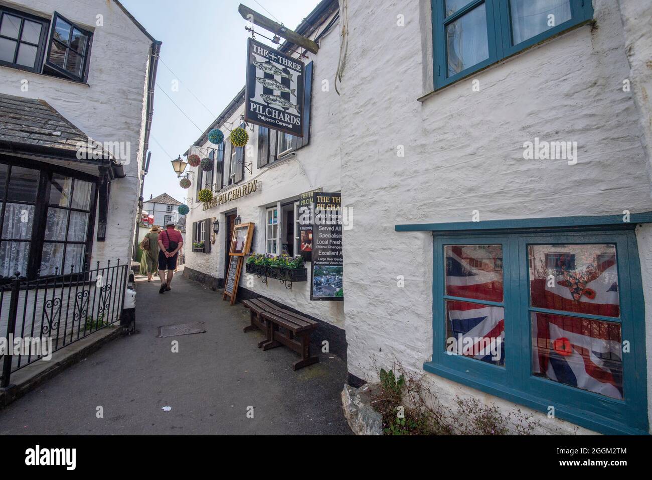 Polperro is a large village, civil parish, and fishing harbour within the Polperro Heritage Coastline in south Cornwall, England. Its population is ar Stock Photo