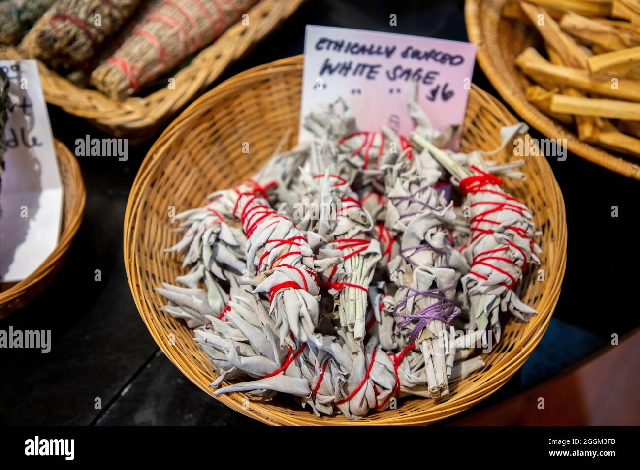 Sage smudge wands at the Scarlet Sage Herbal Apothecary on Valencia Street in The Mission District of San Francisco, California, USA. Stock Photo