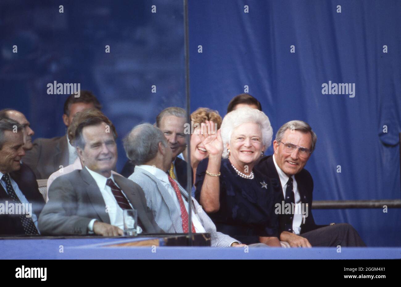 Houston Texas USA, July 1990: Bulletproof glass protects U.S. Pres. George H.W. Bush and First Lady Barbara Bush with other world leaders during a formal session at the Economic Summit of Industrialized Nations. ©Bob Daemmrich Stock Photo