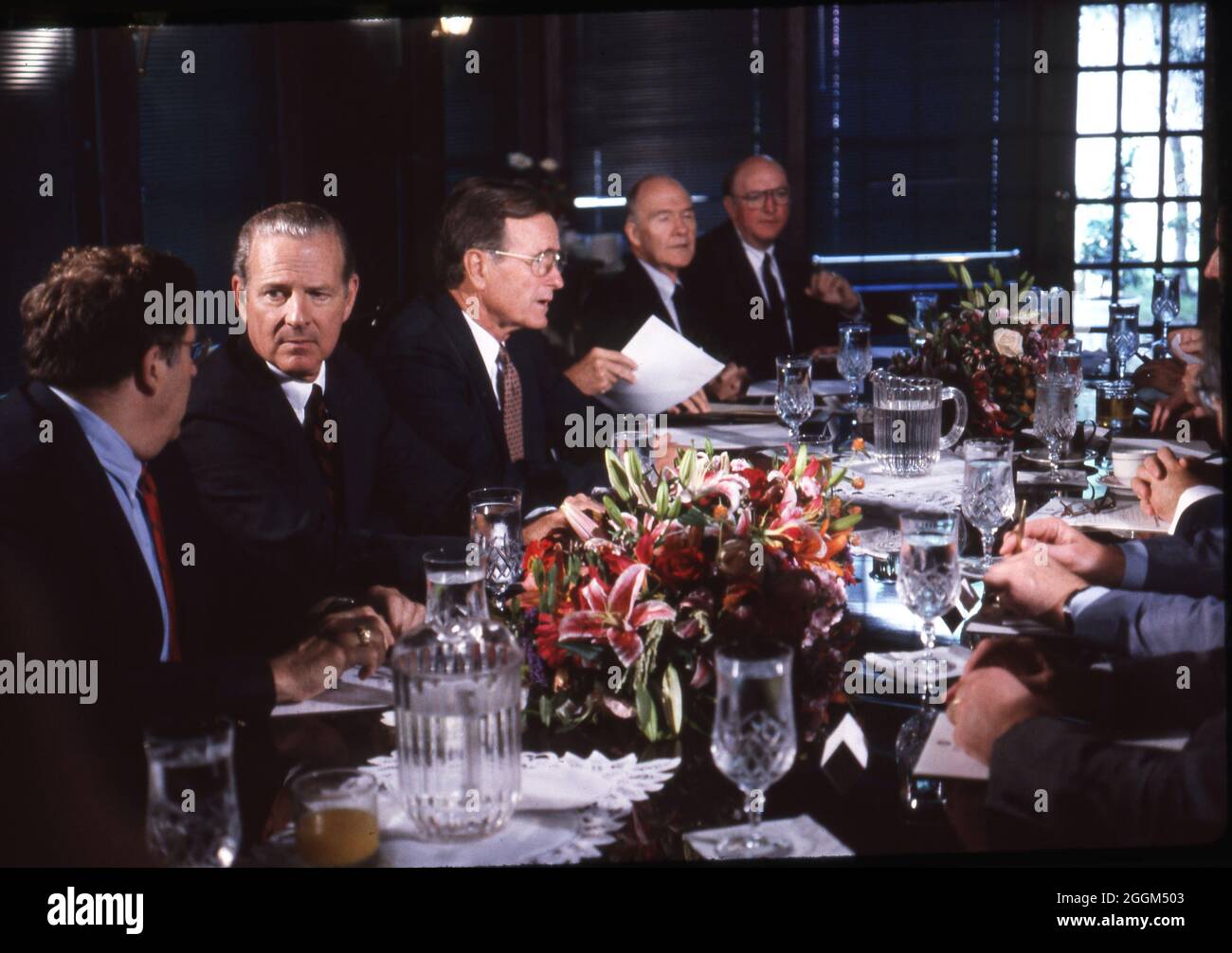Houston Texas USA, July 1990: Dinner at the Houston Economic Summit of Industrialized Nations at the Convention Center and Rice University. U.S. President George H. W. Bush, center left wearing glasses, plays host to other world leaders. ©Bob Daemmrich Stock Photo