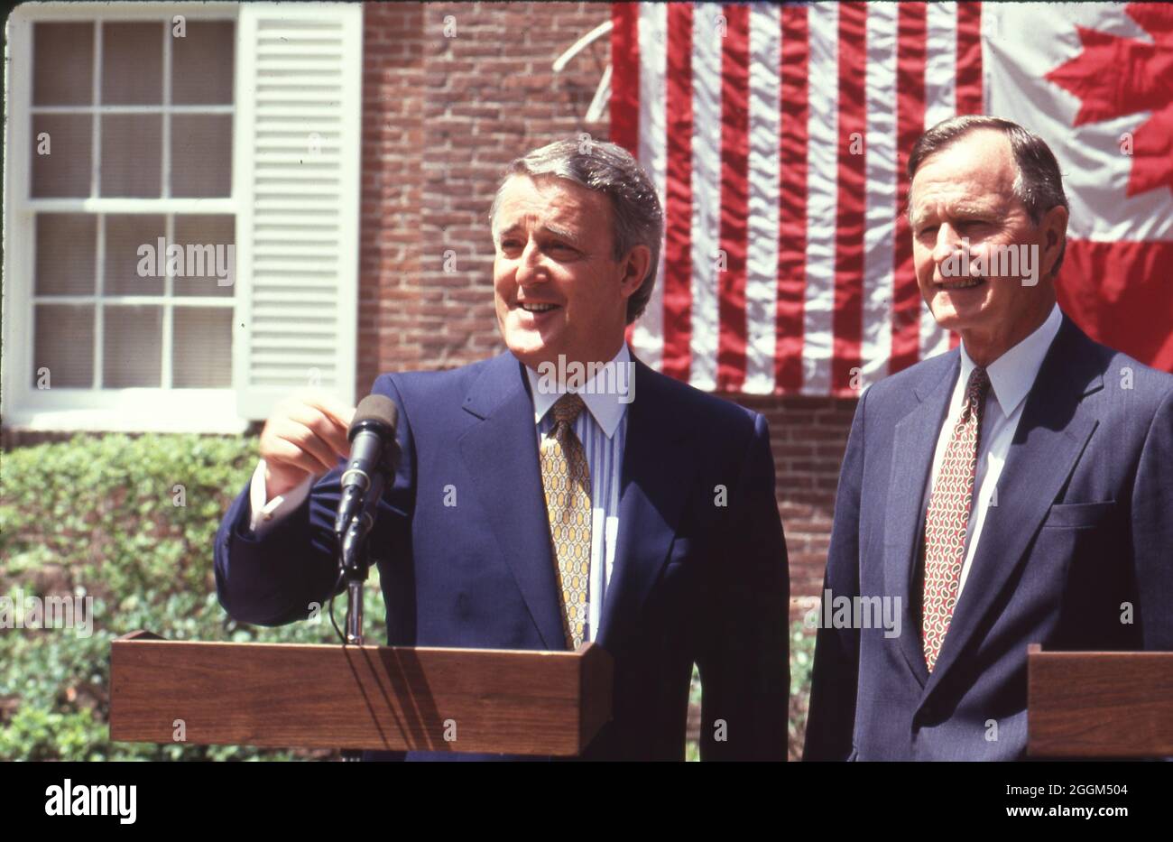 Houston Texas USA, July1990: Canadian Prime Minister Brian Mulroney, left, and United States President George H.W. Bush at the Houston Economic Summit of Industrialized Nations. ©Bob Daemmrich Stock Photo