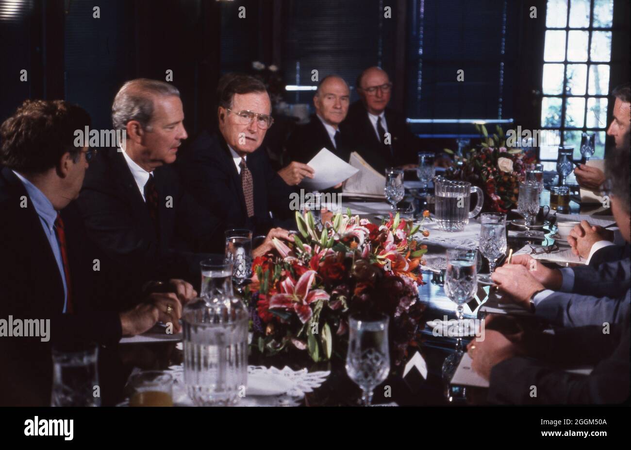 Houston Texas USA, July 1990: Dinner at the Houston Economic Summit of Industrialized Nations at the Convention Center and Rice University. U.S. President George H. W. Bush, center left wearing glasses, plays host to other world leaders. ©Bob Daemmrich Stock Photo