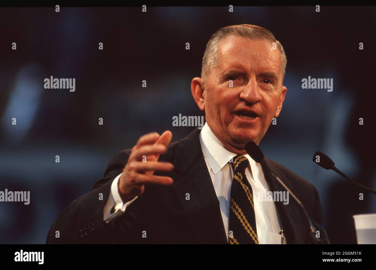 Dallas Texas USA, circa 1992: Billionaire businessman Ross Perot , running for president of the United States as an independent against Republican incumbent George H.W. Bush and Democratic candidate Bill Clinton, speaks  to supporters at a campaign rally at Reunion Arena. ©Bob Daemmrich Stock Photo