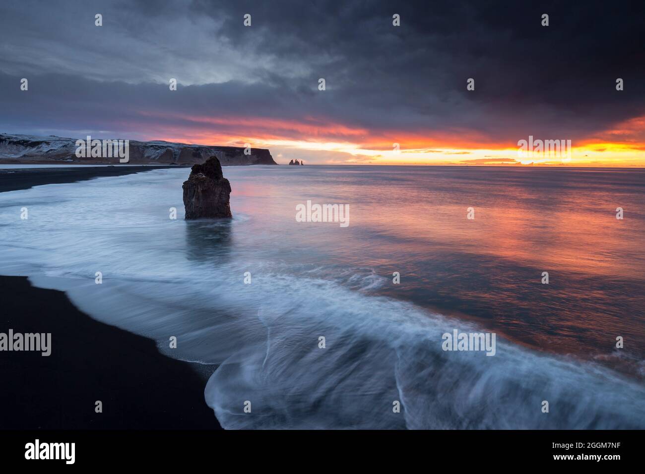 Sunrise on the Black Beach of Iceland with a view of Reynisfjara. Stock Photo