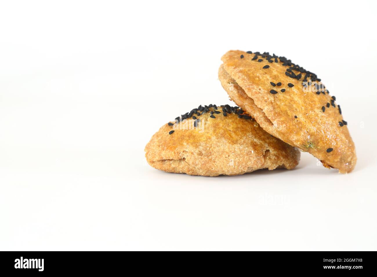 Turkish Pastry Pogaca on white background. Traditional Bakery. Stock Photo