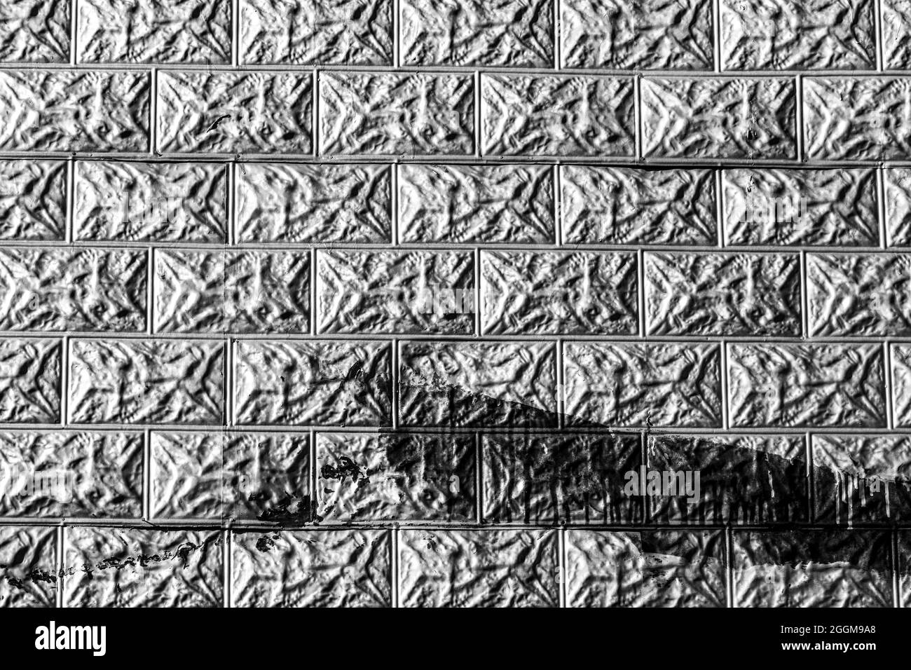 Aluminum siding forms patterns on the historic Todd General Store destroyed by fire in Todd, North Carolina. Stock Photo