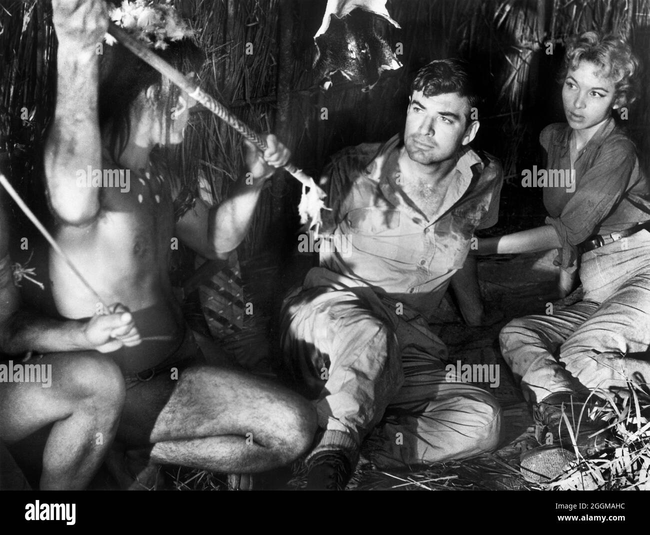 John Bromfield, Beverly Garland, on-set of the Film, "Curucu, Beast of the  Amazon", Universal Pictures, 1956 Stock Photo - Alamy