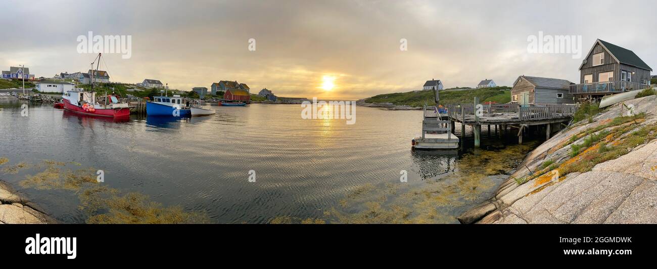 Peggy’s Cove village illuminated at sunset, Nova Scotia, Canada Stock