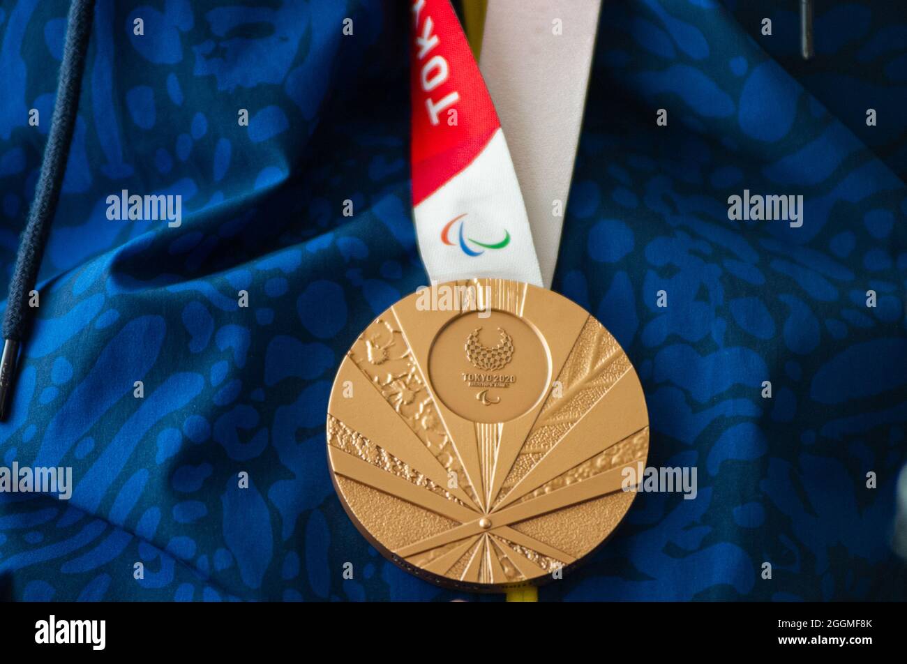 Parapowerlifting paralympic medallist Fabio Torres shows his bronze medal during an event at Hilton Corferias Hotel after Paralympic Medallists Fabio Torres parapowerlifting bronze medal and Moises Fuentes 100 meter swiming silver medal arrived to Colombia after their participation in the Tokyo 2020+1 Paralympic Games. In Bogota, Colombia on September 1, 2021. Stock Photo