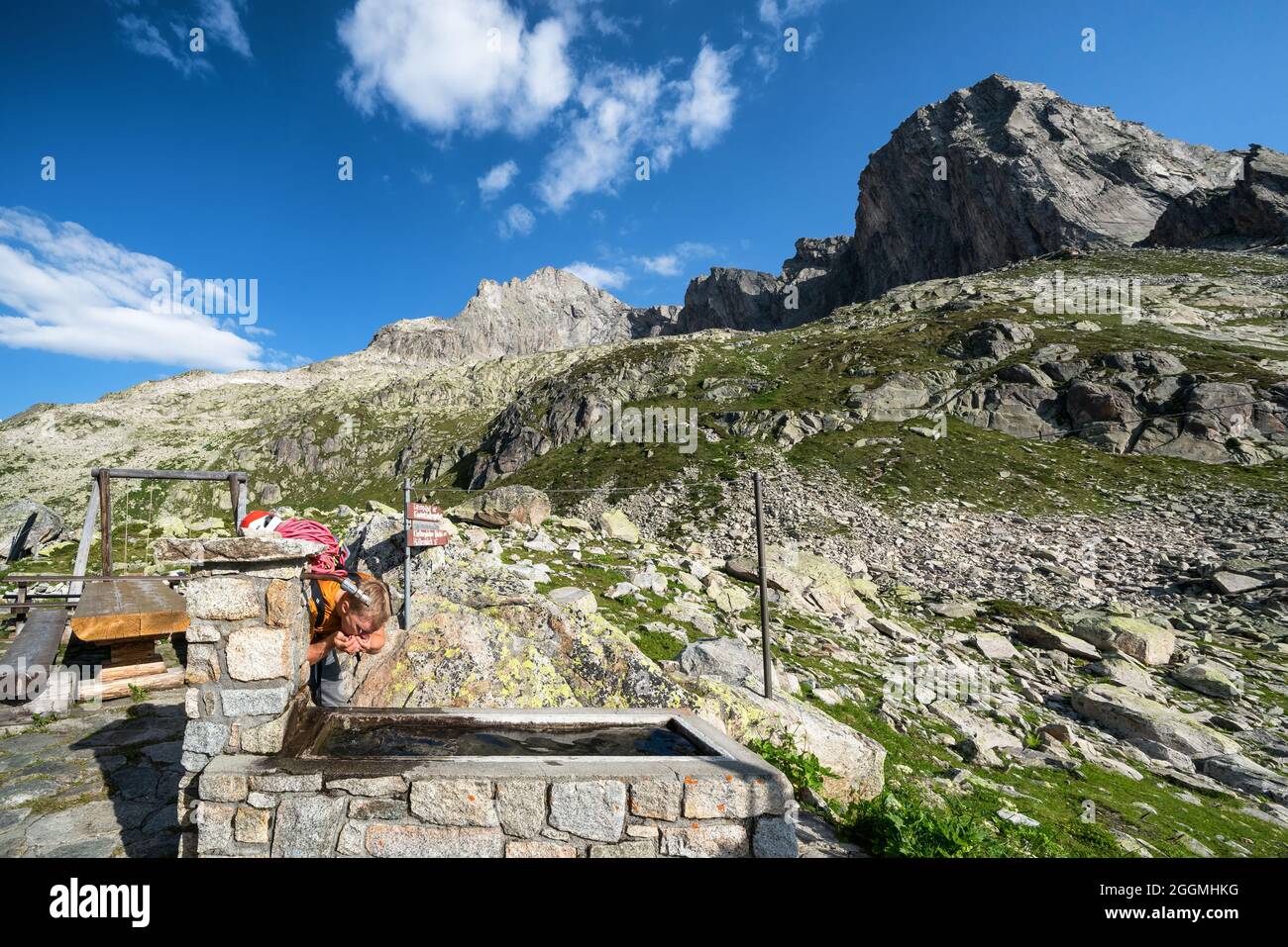 Having a drink at Bergseehütte on the way to multi-pitch rock climbing near Göscheneralp, Switzerland, Alps Stock Photo