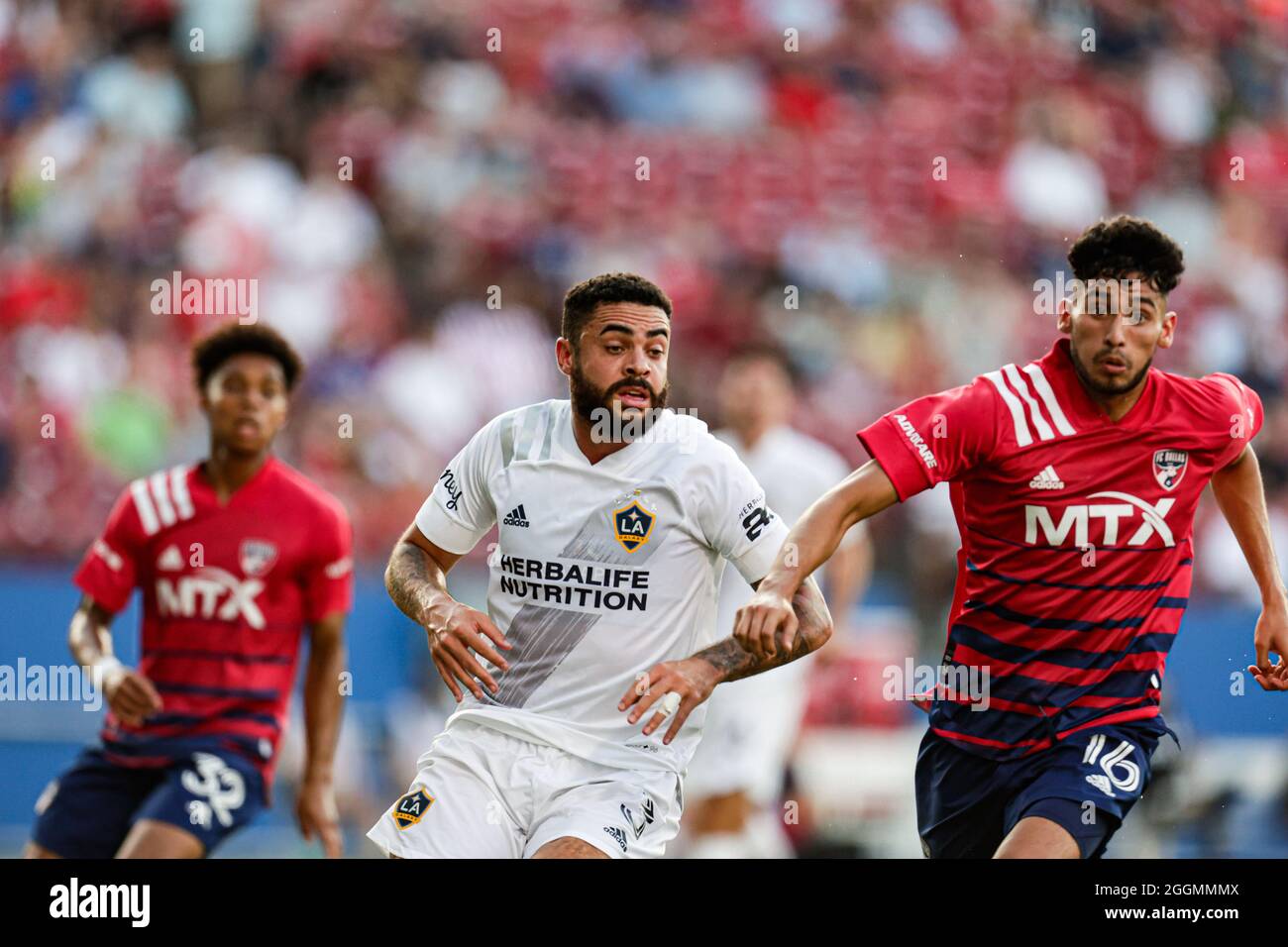 Los Angeles Galaxy defender Derrick Williams (3) and FC Dallas forward Ricardo Pepi (16) battle for control of the ball during a MLS game, Saturday, J Stock Photo