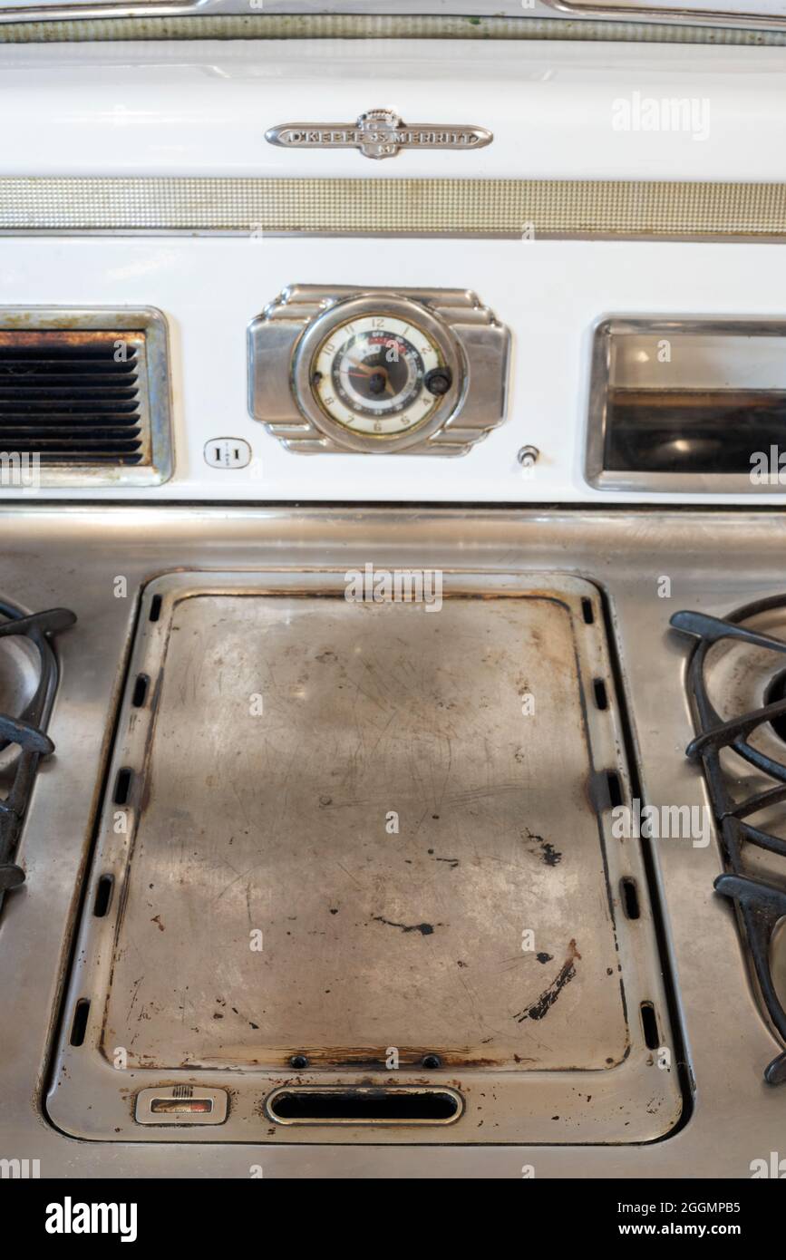 Nutritious handmade corn tortilla cooked on a metal griddle on a gas stove  in a Guatemalan home Stock Photo - Alamy