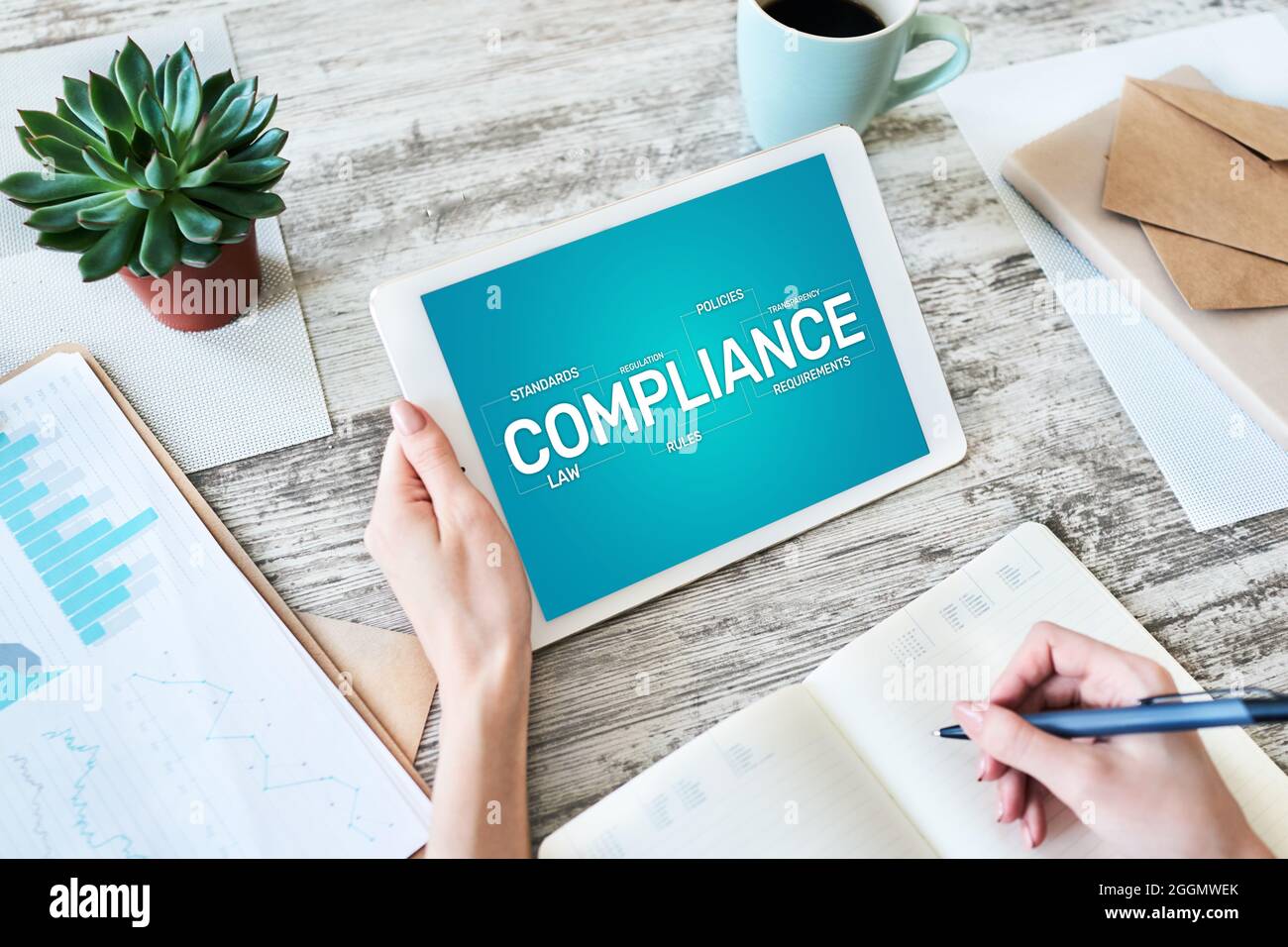 Compliance concept with icons and diagrams. Regulations, law, standards, requirements, audit. Concept on device screen. Stock Photo